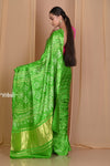 Pehal~ Traditional Blade Green Gajji silk Saree with Golden Bandhani Weave. - verymuchindian.com
