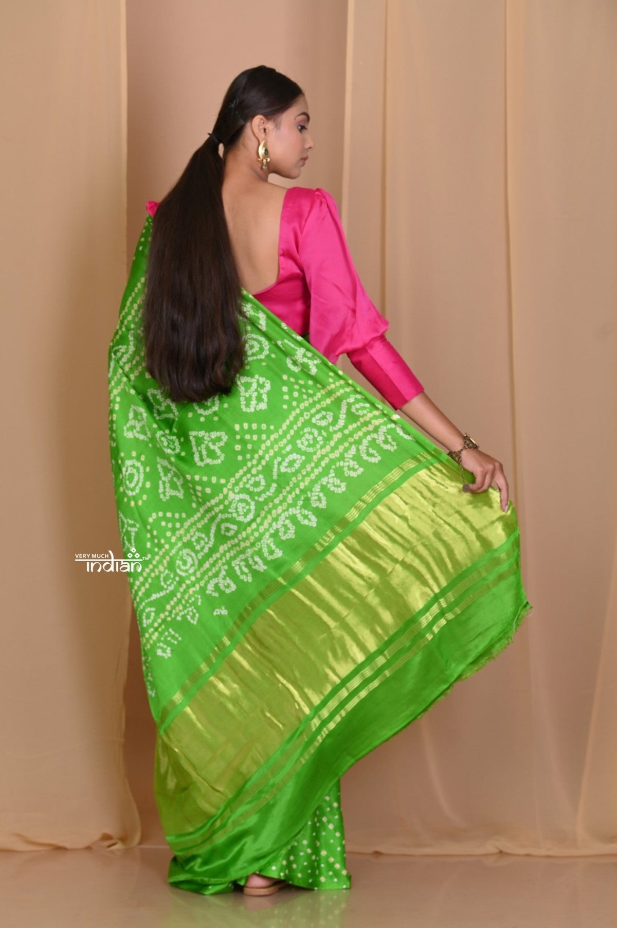 Pehal~ Traditional Blade Green Gajji silk Saree with Golden Bandhani Weave. - verymuchindian.com