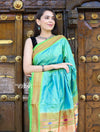 Utsaav ~ Traditional Pure Silk Handloom Paithani ~ Dual Tone Blue Green with Fresh Green Border - verymuchindian.com